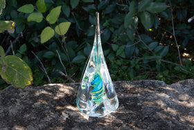 giant glass pyramid with cremation ash