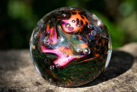 Glass orbs with cremation ash