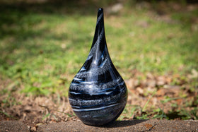 glass vase with cremation ash