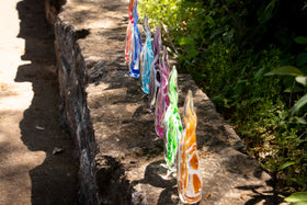 glass flame with cremation ash from pets and people