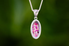 opal pendant with cremation ash inside