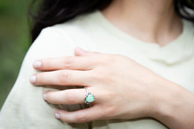 Cremation ring sterling silver mushroom motif worn by young woman