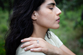 cremation ring sterling silver with ash leaf being worn by young mexican woman