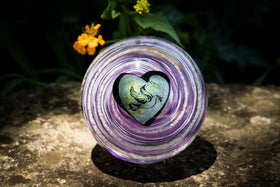 dove glass orb with cremation ash