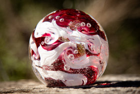 Glass orbs with cremation ash