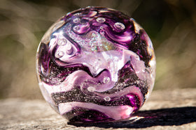 Glass orbs with cremation ash