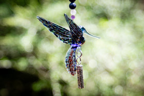 hummingbird with silver keepsake pendant