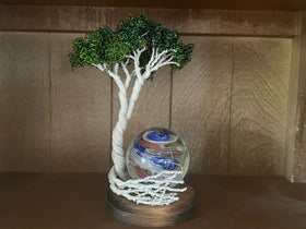 white birch tree of life with memorial flame with ash