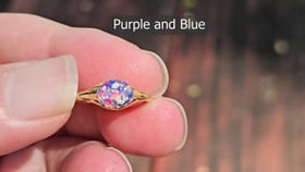 golden oval cremation ring video being held