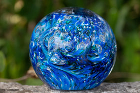 Glass orbs with cremation ash