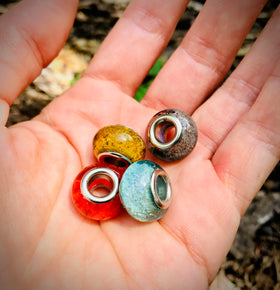 transparent bead with cremation ash