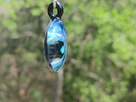space pendant with opal