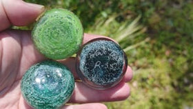 glass touchstones with cremation ash from people and pets