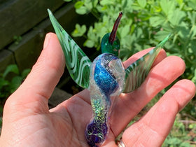 Dichroic glass hummingbird with cremation ash