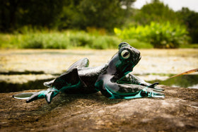 glass frog with cremation ash