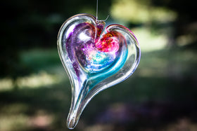 glass heart with cremation ash