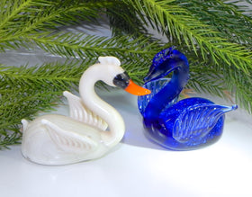 swan figurine with cremation ash