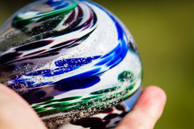 cat eye orb with cremation ash from people