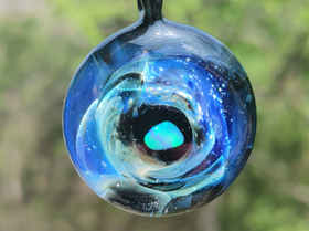 deep space pendant with cremation ash from pets and people
