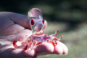 glass octopus figurine with cremation ash