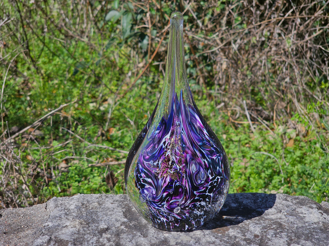 purple nebula flame with cremation ash