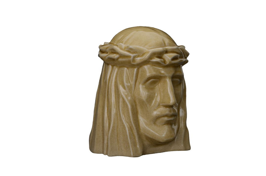 Beige ceramic Christ head urn with a crown of thorns, front view