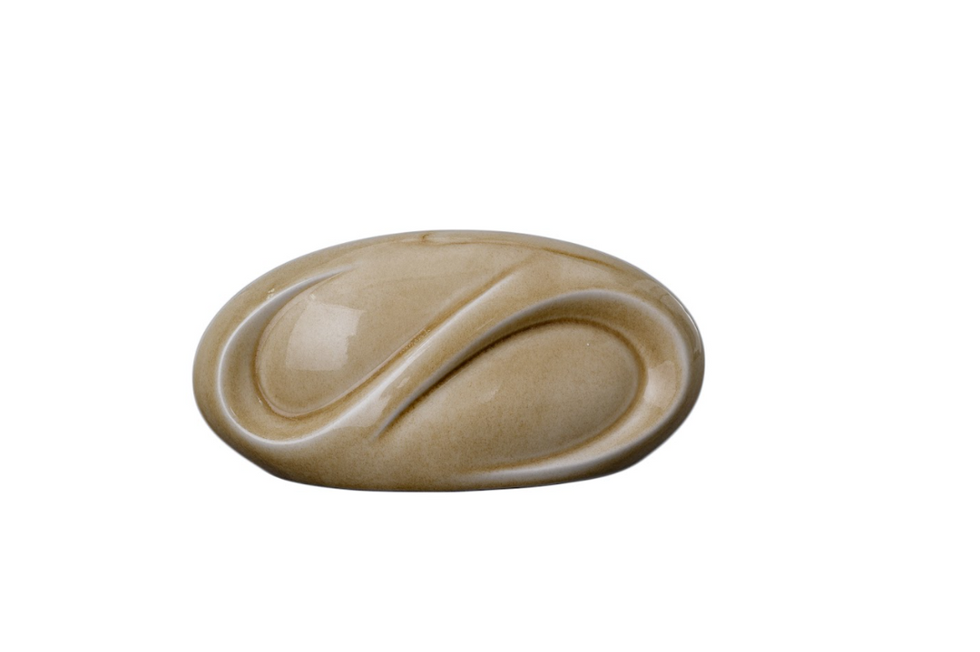 Beige Eternity Ceramic Urn featuring a warm glaze and graceful curved form