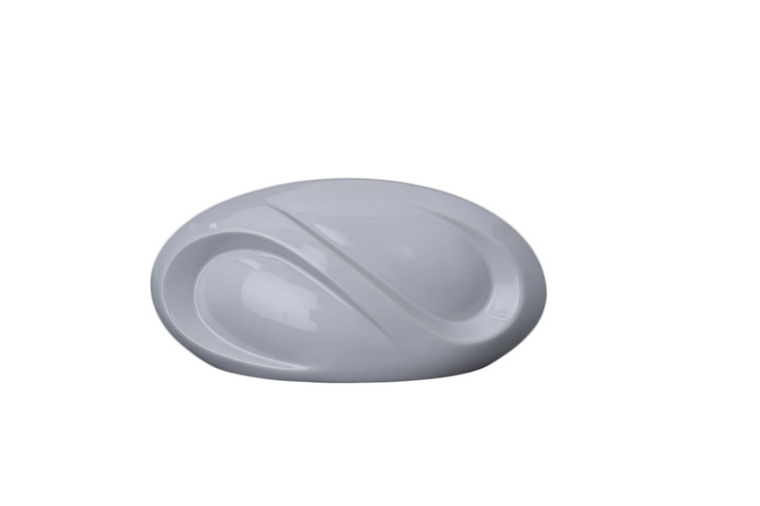 Soft gray Eternity ceramic urn with curved sculptural form and integrated candle holder.