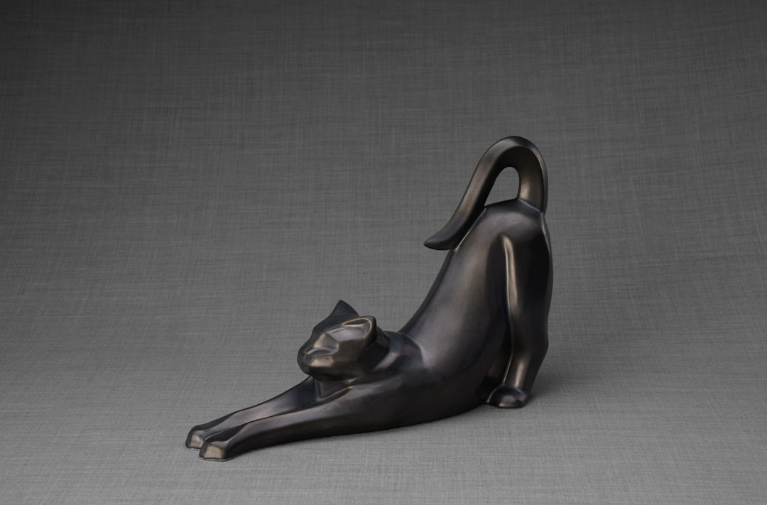Grace Cat Ceramic Urn in dark glaze with a stretching cat and a small cat beside it