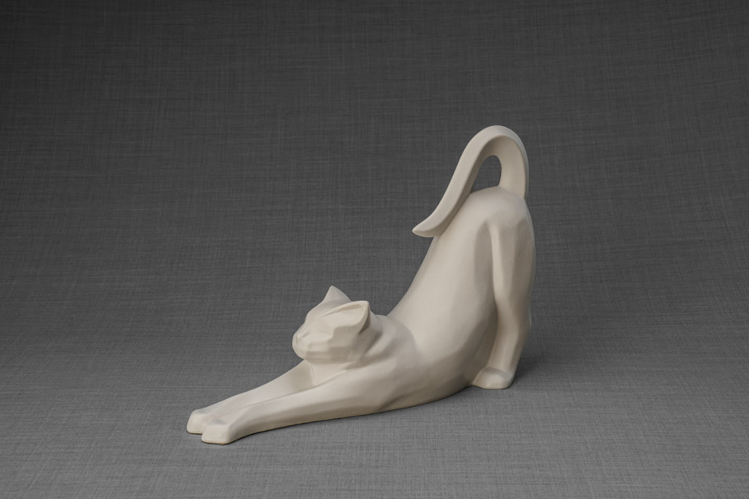 Grace cat ceramic urn in a stretching pose with a kitten beside it on a gray backdrop