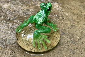 glass peeper frog with cremation ash in green