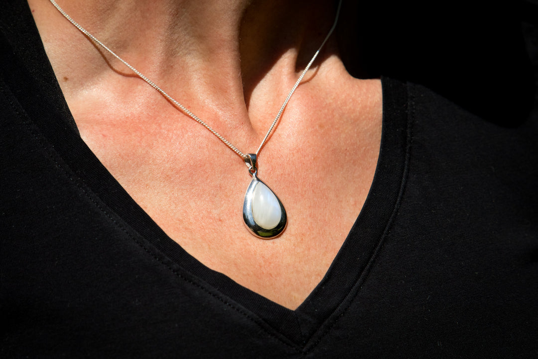engravable pendant worn moonstone