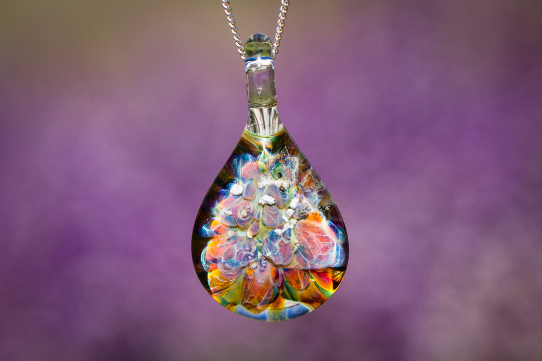Rainbow Sky glass pendant infused with cremation ashes on a silver chain