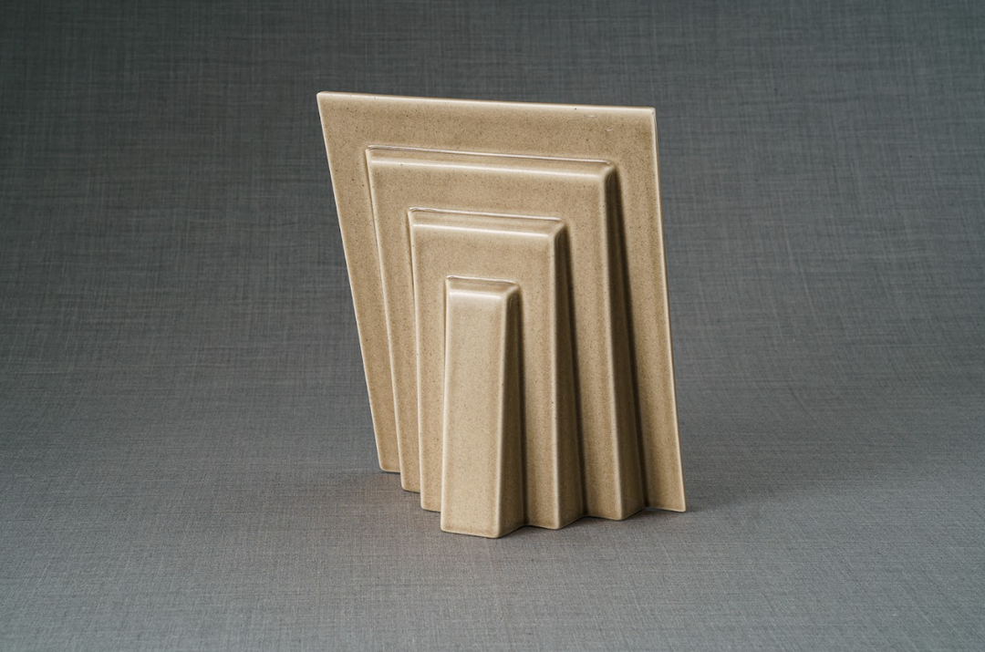 Beige ceramic nested rectangular frame sculpture from the Labrador Frame collection.