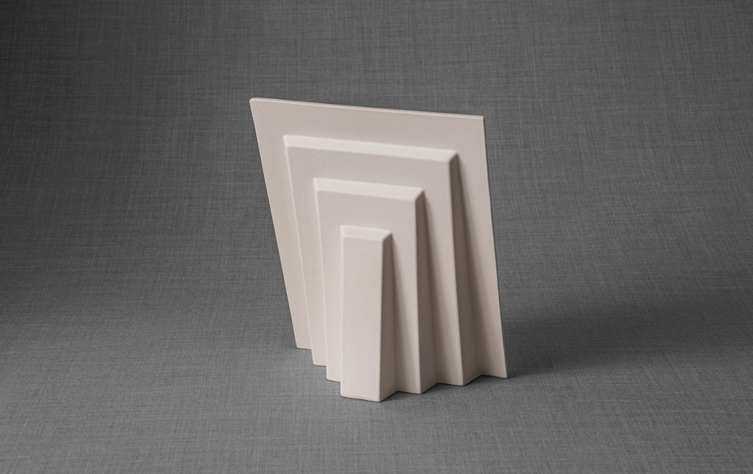 Back view of layered rectangular frames in pale ceramic finish.
