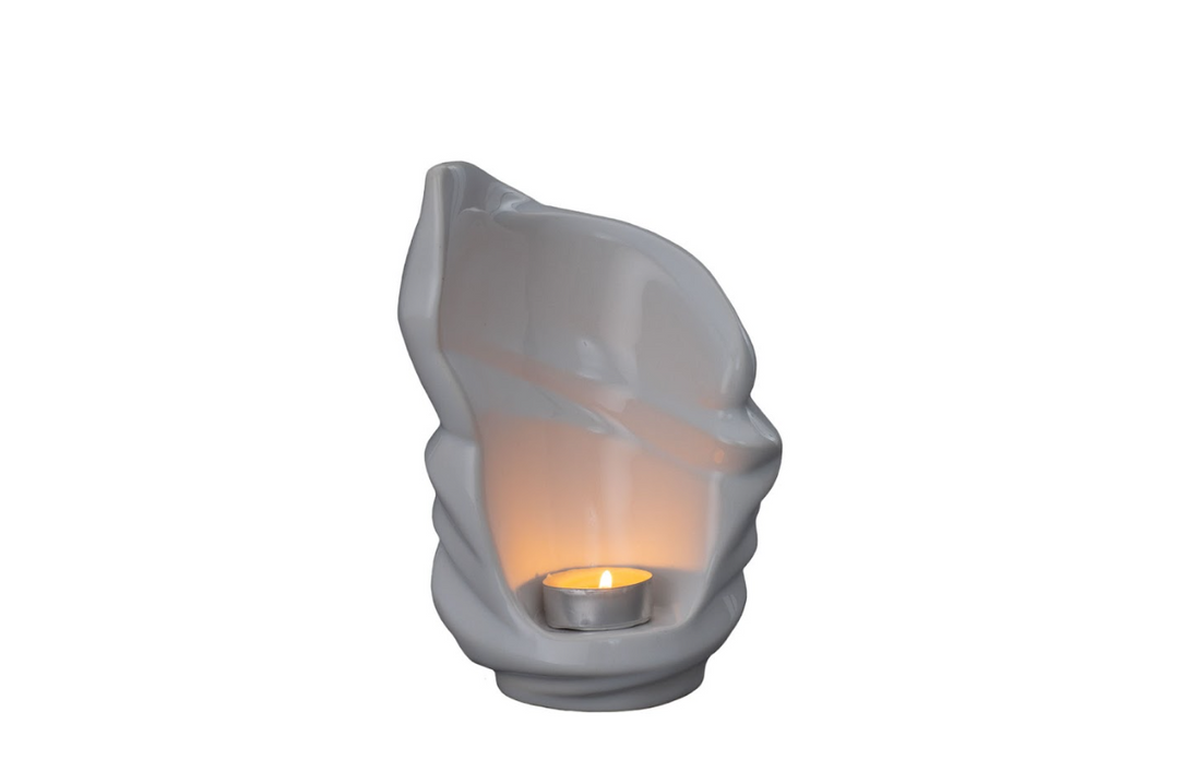 White Light Ceramic Urn with a glowing candle inside