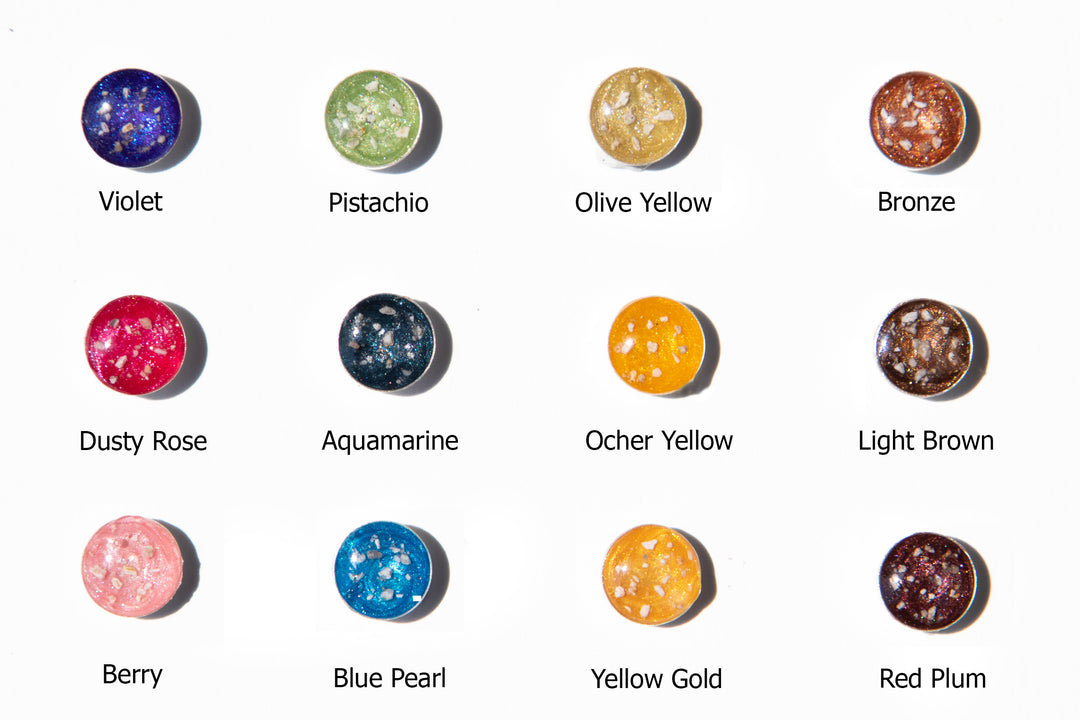 Bead color options for the pawprint bracelet including violet pistachio olive yellow bronze dusty rose aquamarine ocher yellow light brown berry blue pearl yellow gold red plum