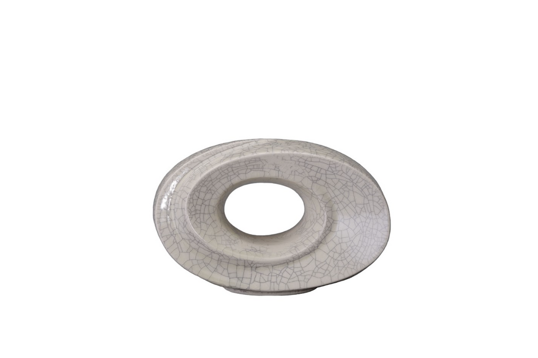 Top view of crackled beige The Passage ceramic urn with a circular hollow center.