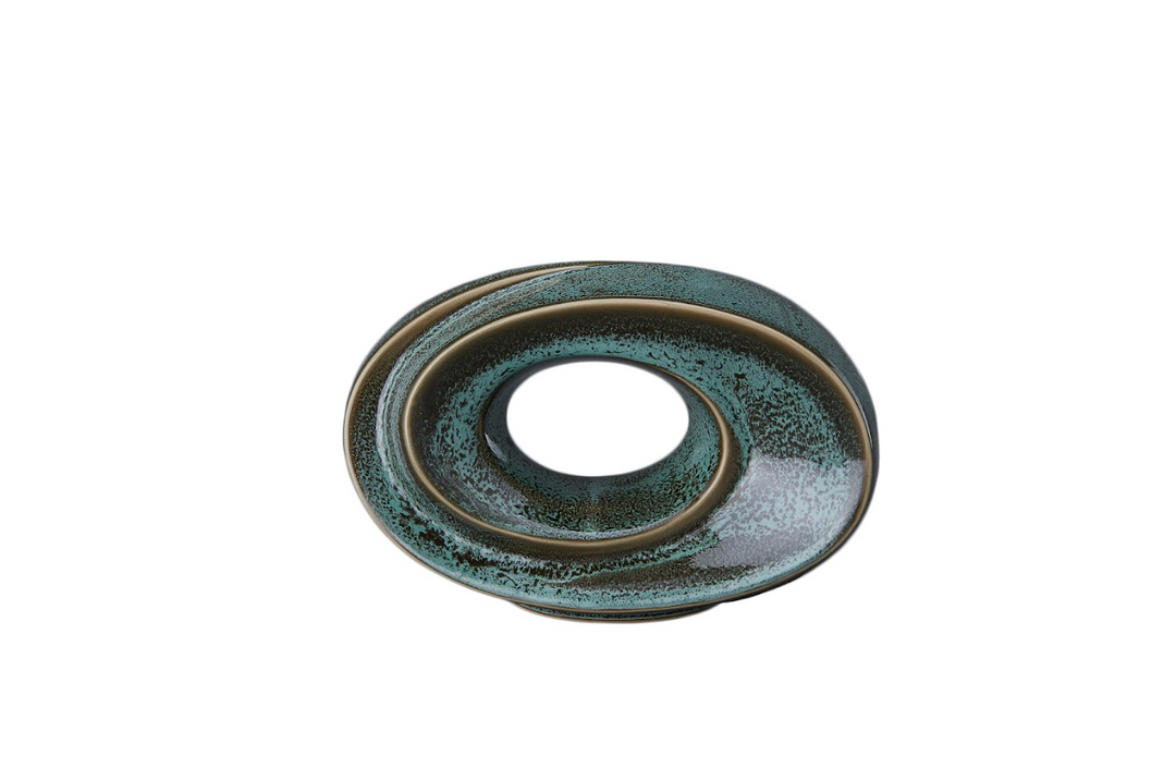 Teal The Passage ceramic urn with a flowing circular spiral and hollow center edged in bronze.