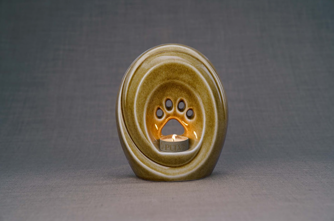 Brown glazed Paw Ceramic Urn with built in candle holder and paw print design.
