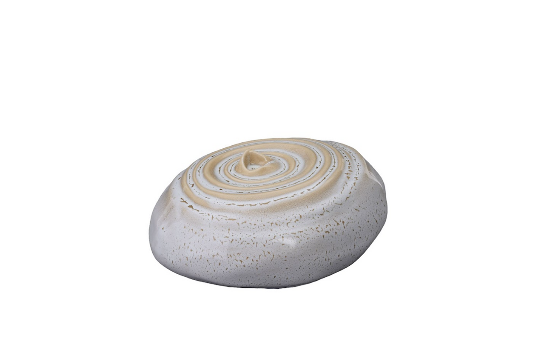 White speckled Resonance ceramic urn with a tan spiral lid on a white background
