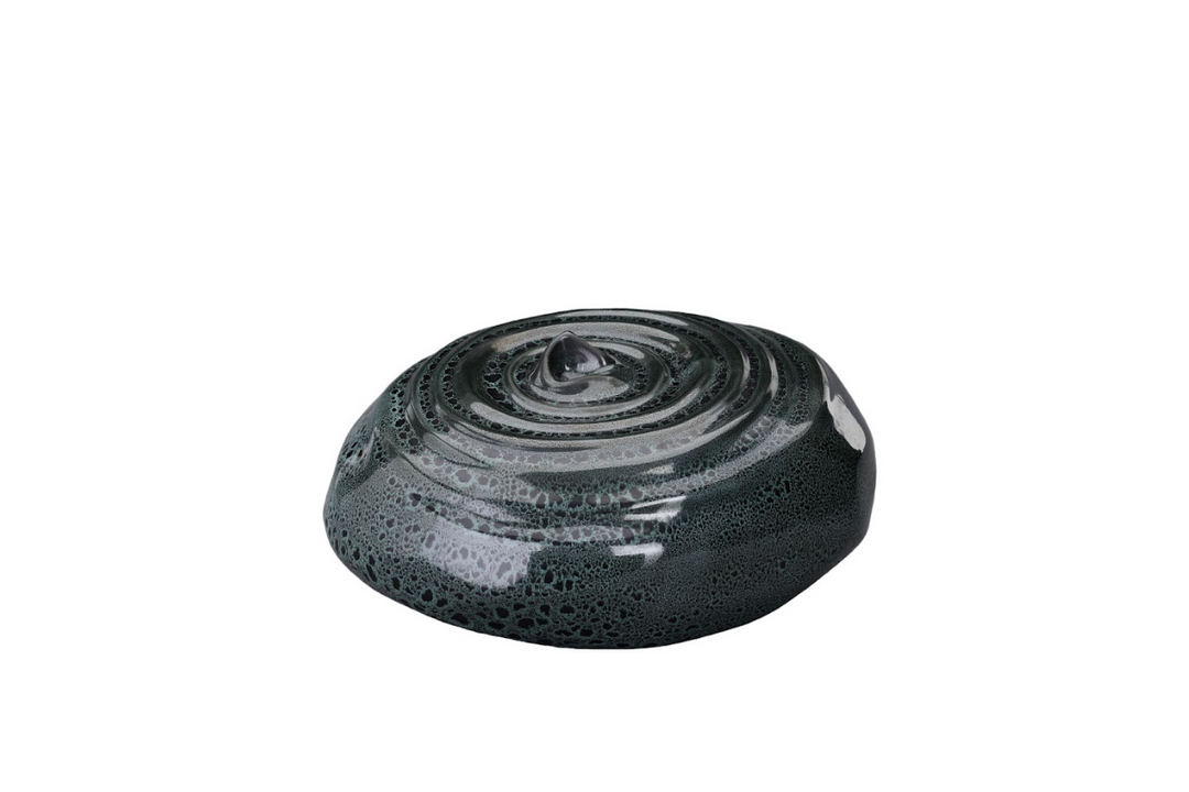 Resonance Ceramic Urn in dark teal glaze with spiraled top and bubbling texture, bottom-filled.