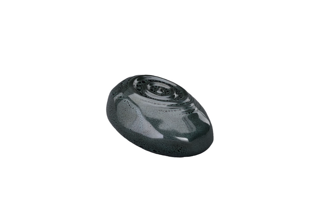 Dark teal Resonance ceramic urn viewed from the side with a spiral lid pattern