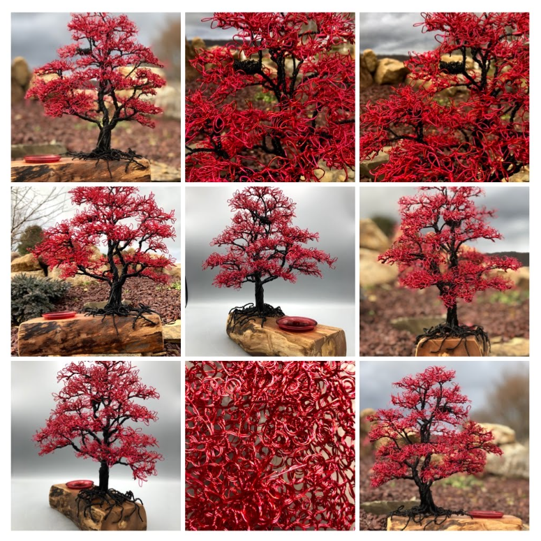 Red Maple Tree of Life wire tree on a natural wood base with a small red votive disc beside it