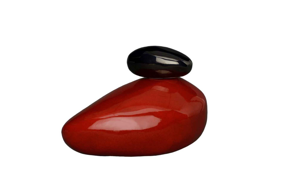 Red glazed Stone Ceramic Urn with a black pebble on top