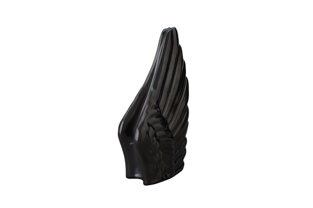 Black Wings ceramic urn silhouette with layered feather texture seen from the side.