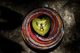 angel paperweight with cremation ash