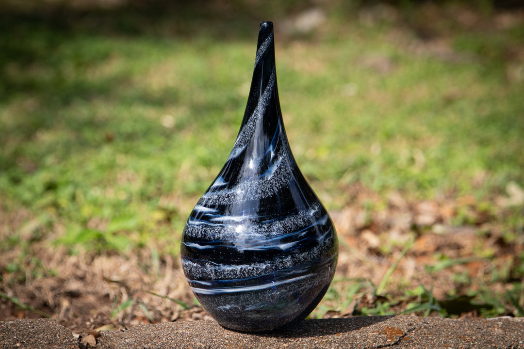 glass vase with cremation ash