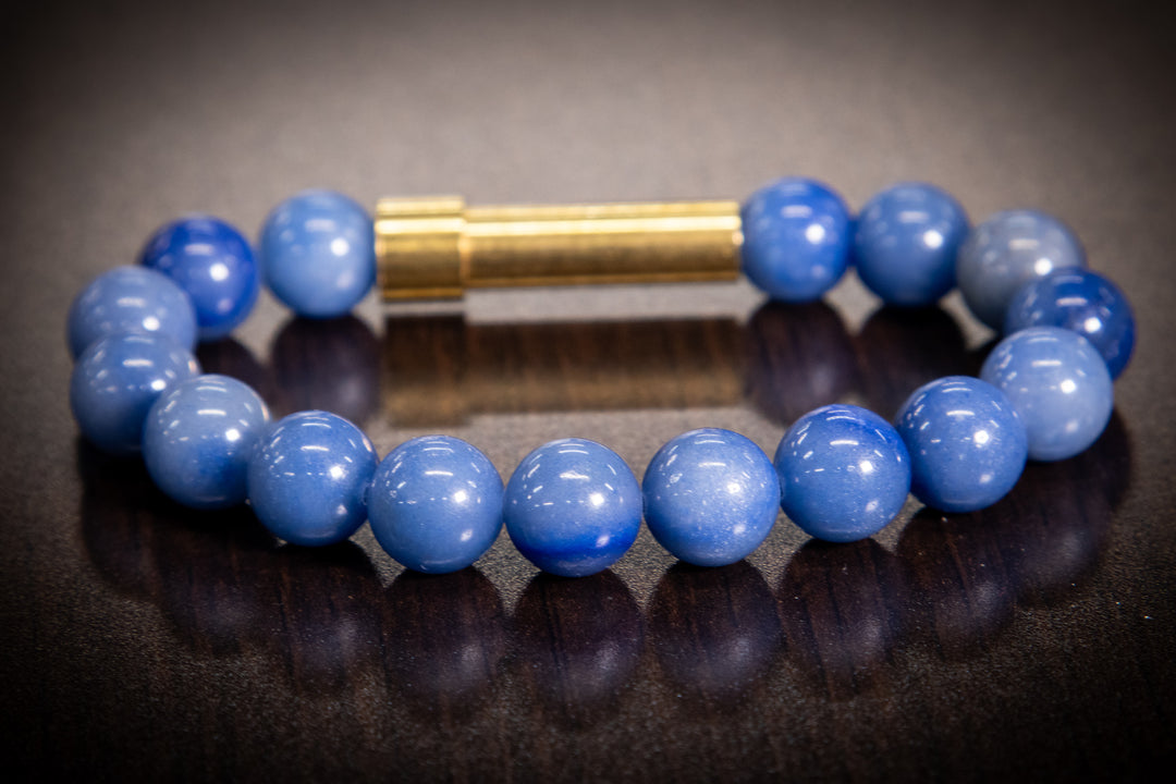 Blue Apatite healing bracelet with a fur or ashes keepsake charm and round blue beads.
