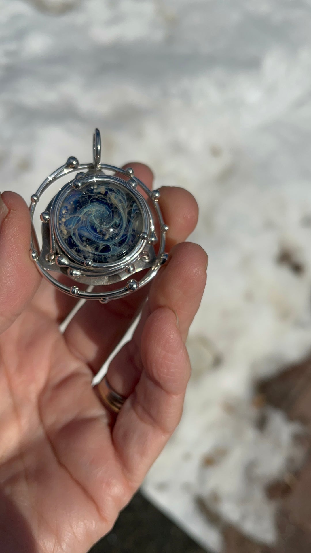 caged galaxy pendant with cremation ash